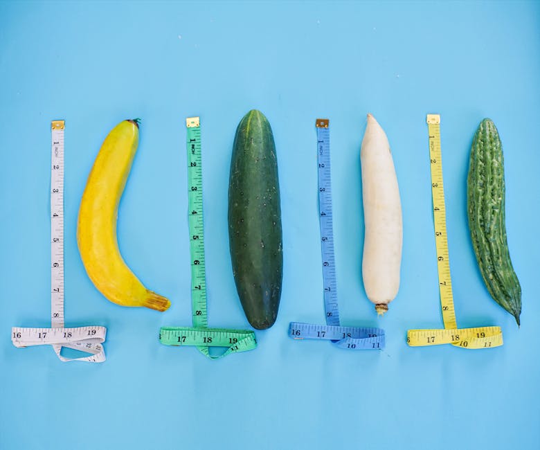 A vibrant still life of various vegetables and measuring tapes on a blue backdrop.